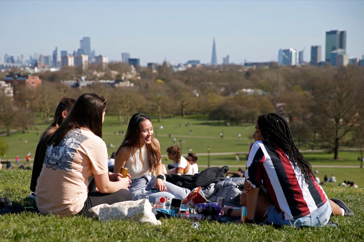 Friends hanging out in the park